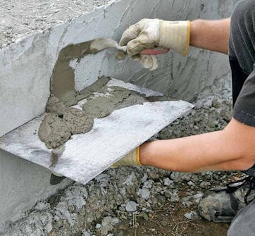 Autotallin perustus: Levitä kolmas rappauskerros Autotallin perustus: Levitä kolmas rappauskerros